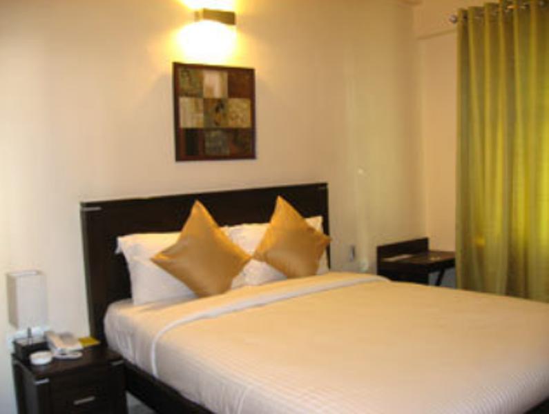 Hotel The Elite Suites Pune Habitación foto